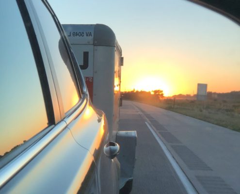 Sunrise car pulling U Haul Trailer - moving to Grand Junction