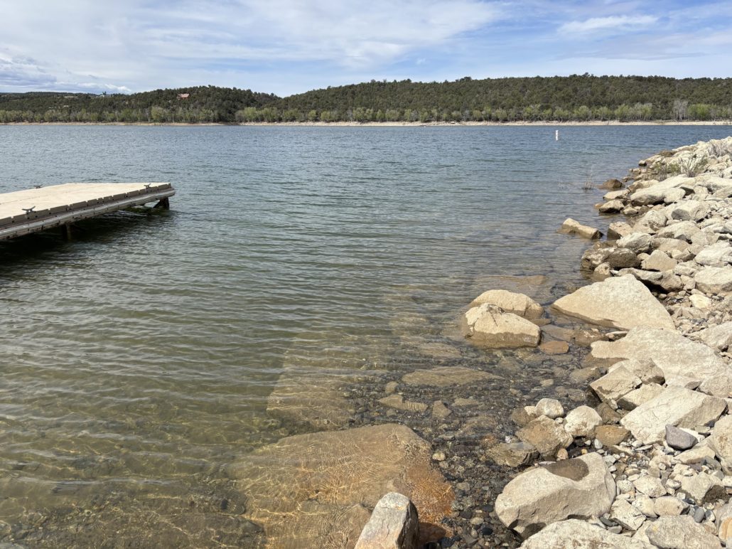 Crawford Reservoir Boat Ramp near Visitor Center shows rocky shoreline and floating dock