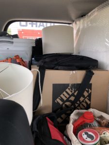 Moving preparation boxes and items in the back of the car