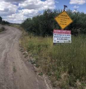 Last Dollar Road Caution Sign