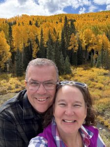 bright orange and yellow fall leaves and Michelle and Paul Aspelin