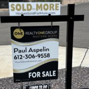 Sold for More Sign on Listing Sign Grand Junction Listing Agent Homes Sold For More For Sale Sign in the Yard