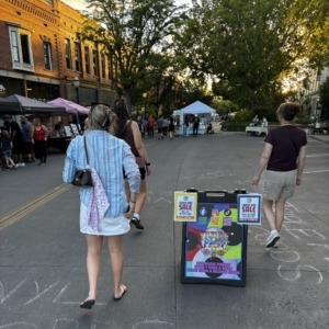 Megan and Michelle walking down Main Street at the Market on Main in Grand Junction